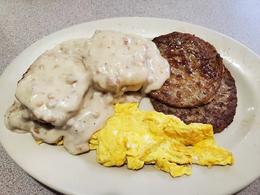 2 Eggs 2 Biscuits Topped with Sausage Gravy 2 Patty Sausages
